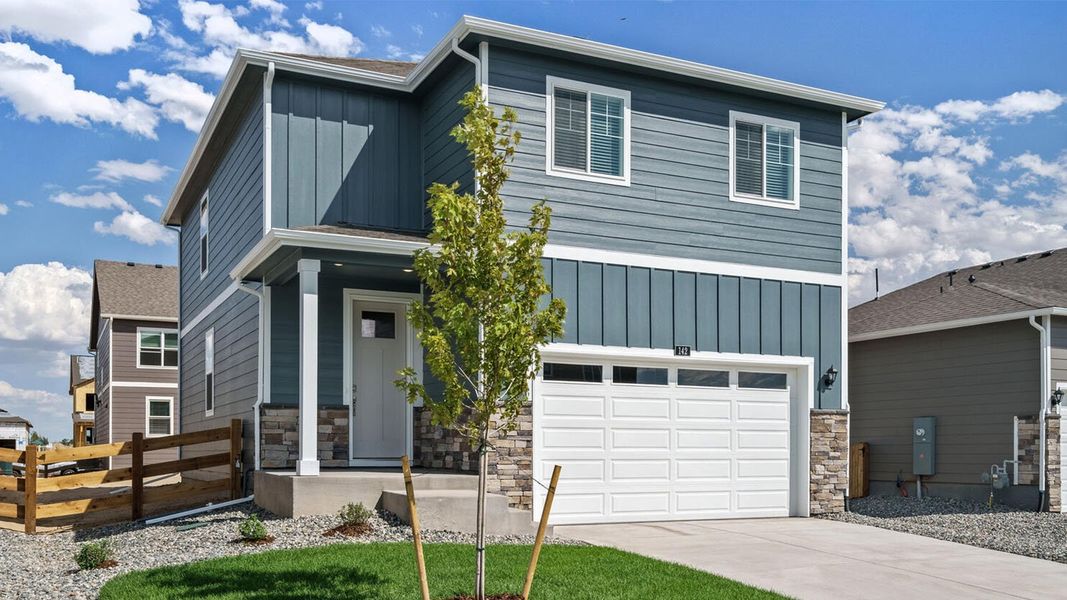 Front exterior of a home in the Granary community, located in Johnstown, CO (Image 5). Front exterior of a home in the Granary community, located in Johnstown, CO (Image 5).