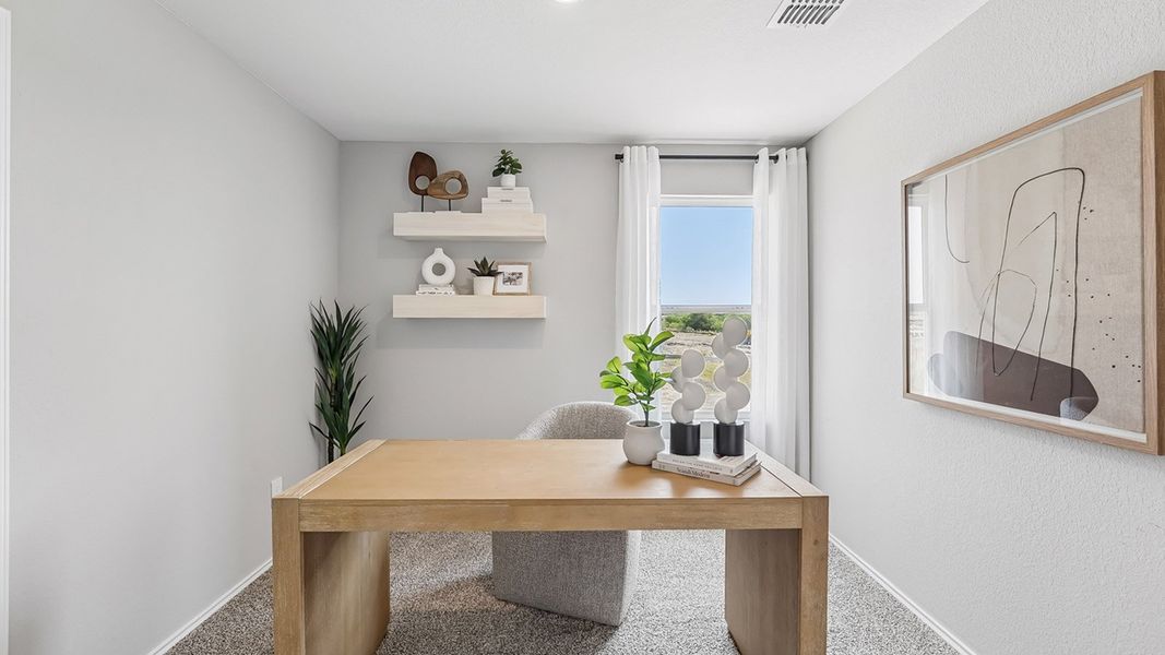 Furnished interior in a model home at Marigold in Kyle (Image 25).