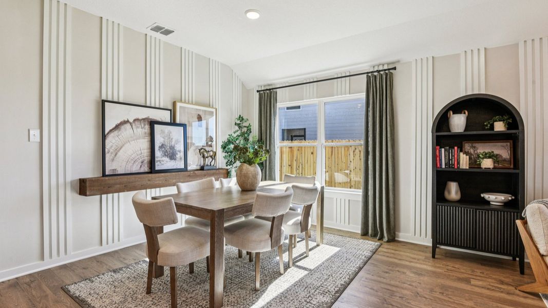 Casual dining area opens to the great room and has plenty of windows for natural light Casual dining area opens to the great room and has plenty of windows for natural light