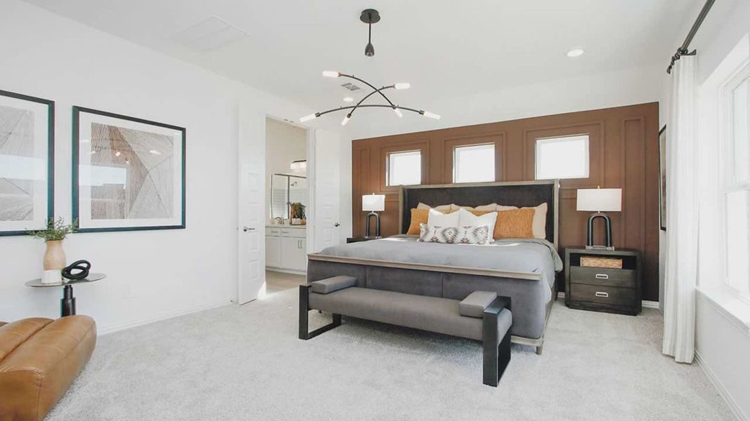 Luxurious bedroom with rich wood accent wall, stylish chandelier, plush carpet in Cypress Green. Luxurious bedroom with rich wood accent wall, stylish chandelier, plush carpet in Cypress Green.