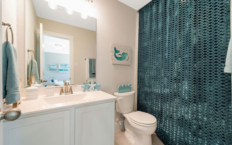 Furnished interior in a model home at Hunter's Ranch in San Antonio (Image 36).