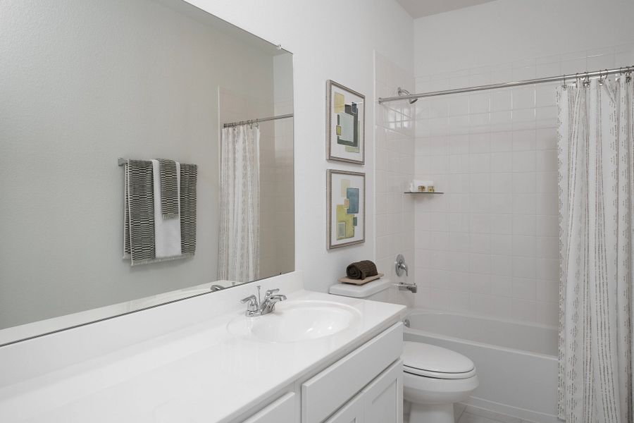 Furnished interior in a model home at Spring Creek Trails in Magnolia (Image 11). Furnished interior in a model home at Spring Creek Trails in Magnolia (Image 11).