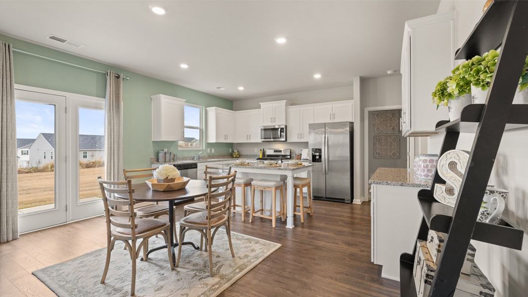 Furnished interior in a model home at Highland Hills in Graniteville (Image 14).