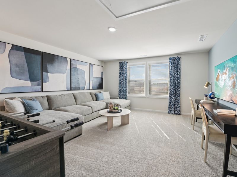 Furnished interior in a model home at Marshburn Landing - Signature Series in Wendell (Image 13).
