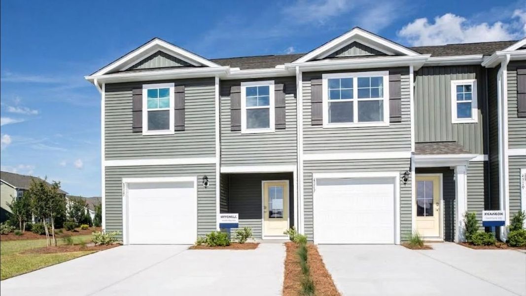 Front exterior of a home in the The Landing at Sidbury Station community, located in Castle Hayne, NC (Image 4). Front exterior of a home in the The Landing at Sidbury Station community, located in Castle Hayne, NC (Image 4).