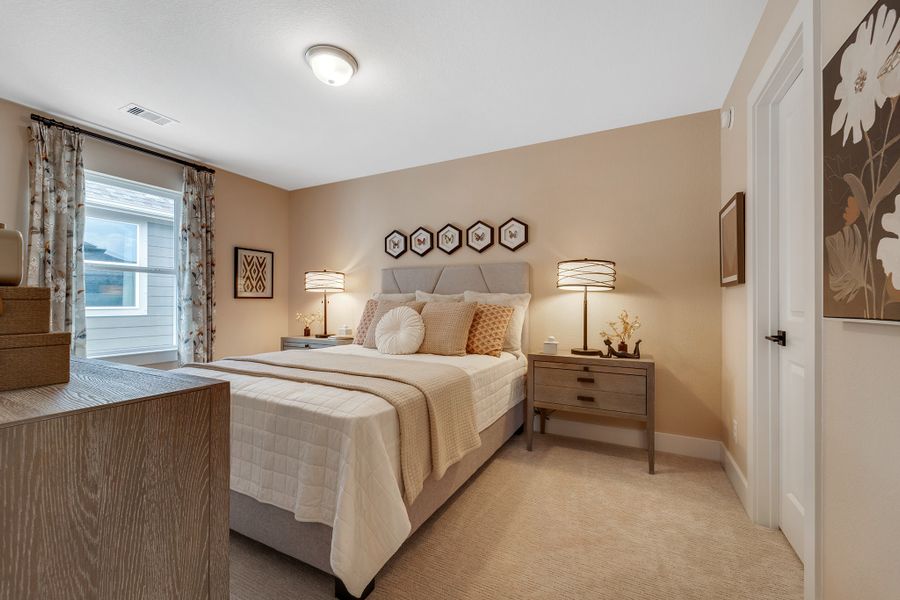 Furnished interior in a model home at Creekhaven in Iowa Colony (Image 20).