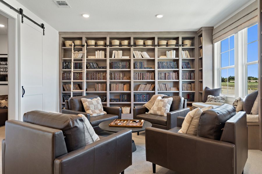 Furnished interior in a model home at Park Collection at Lariat in Liberty Hill (Image 6).