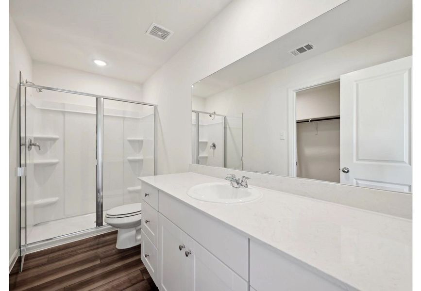 Furnished interior in a model home at Liberte in Converse (Image 10).