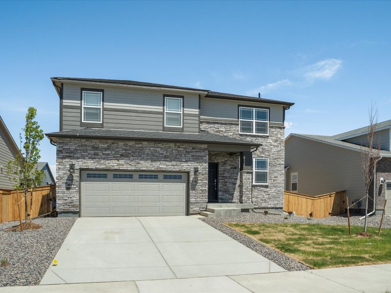 Waterton front exterior at a Meritage Homes community in Brighton, CO.