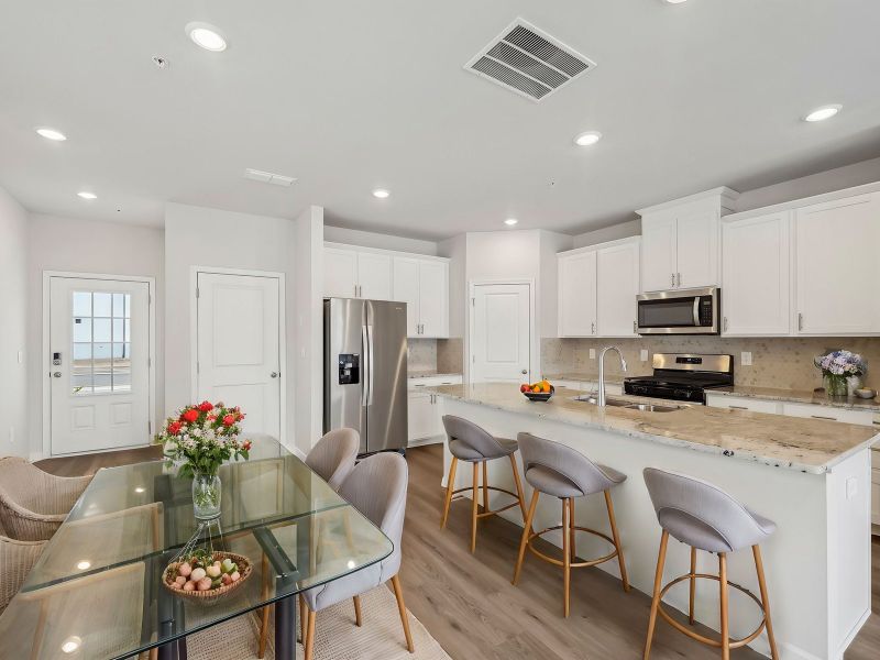 Furnished interior in a model home at Brooks Lake in Loganville (Image 6).