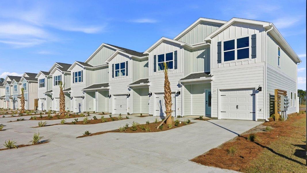 Front exterior of a home in the Colonial East Townhomes community, located in Panama City Beach, FL (Image 3).