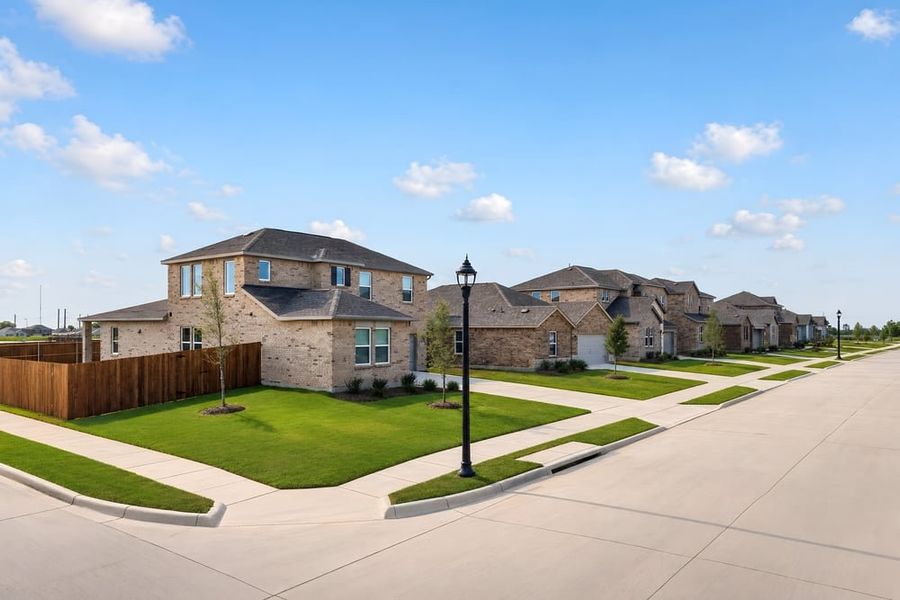 Front exterior of a home in the Parks at Foster Crossing community, located in Anna, TX (Image 5).
