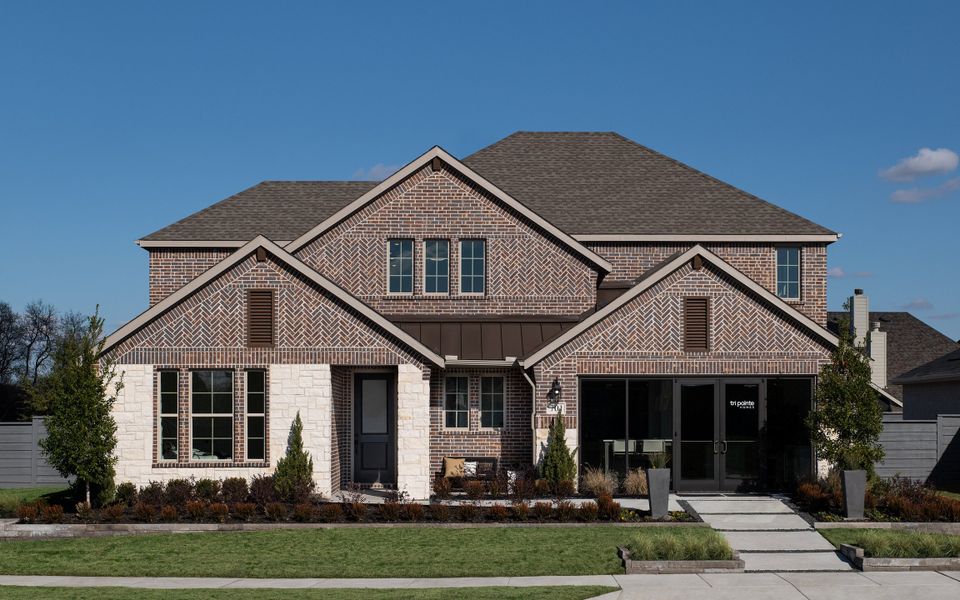 Front exterior of a home in the View at the Reserve 60s community, located in Mansfield, TX (Image 11).