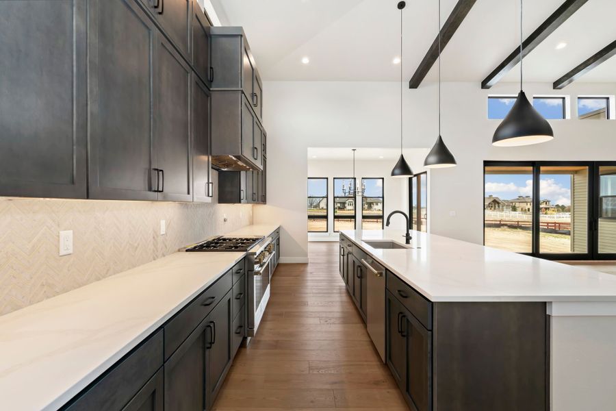 Furnished interior in a model home at Acadia at RainDance in Windsor (Image 17).
