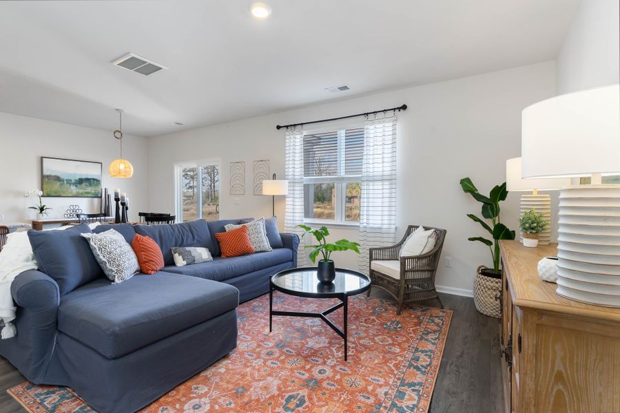 Furnished interior in a model home at Island Green in Myrtle Beach (Image 29).