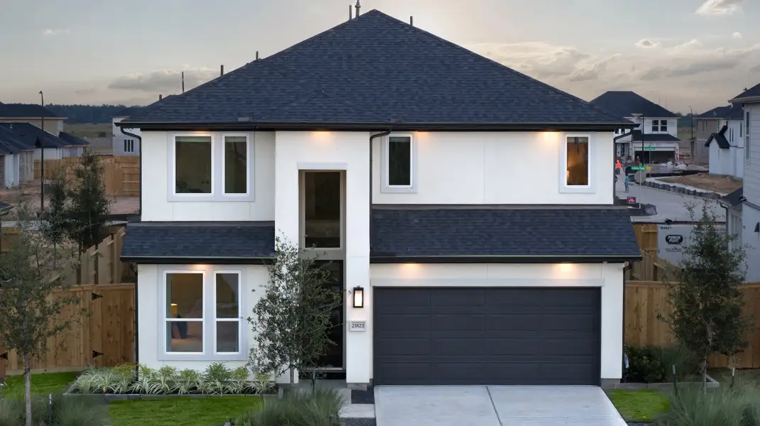 Front exterior of a home in the Avalon at Cypress 50s community, located in Cypress, TX (Image 1).