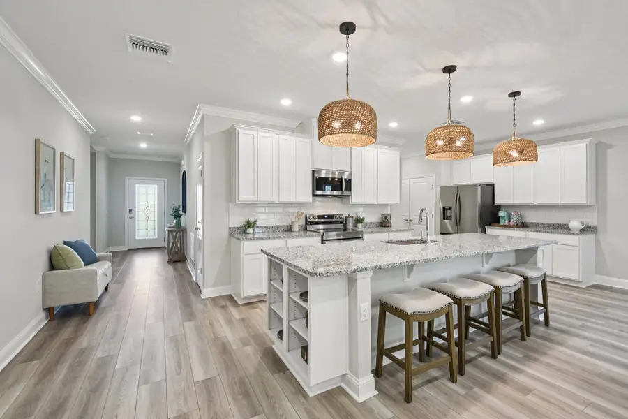 Furnished interior in a model home at Briarwood in Alachua (Image 6).