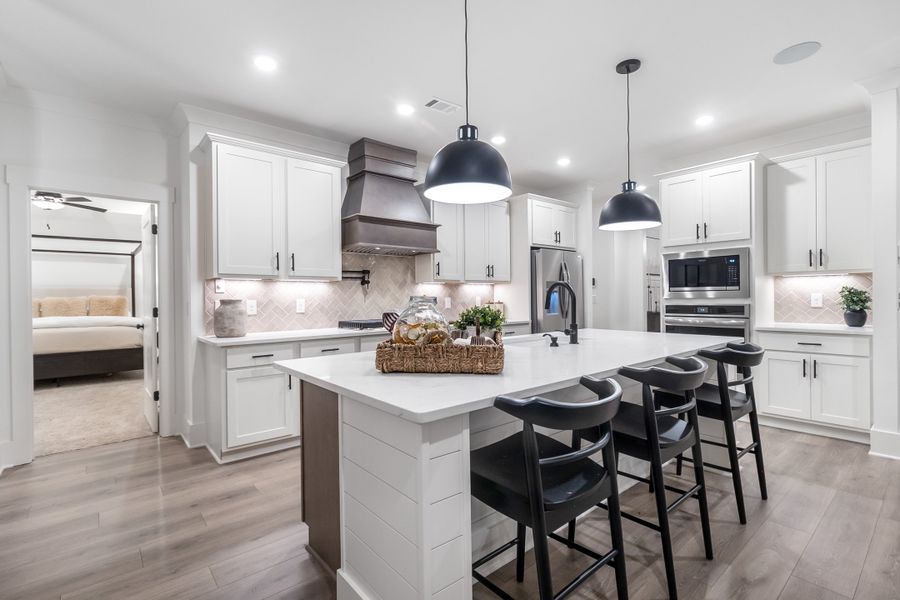 Furnished interior in a model home at Weslyn Park in Social Circle (Image 8).