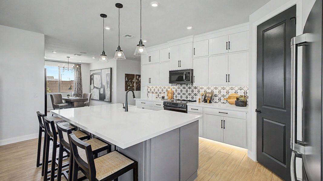Furnished interior in a model home at Apache Farms in Buckeye (Image 17).