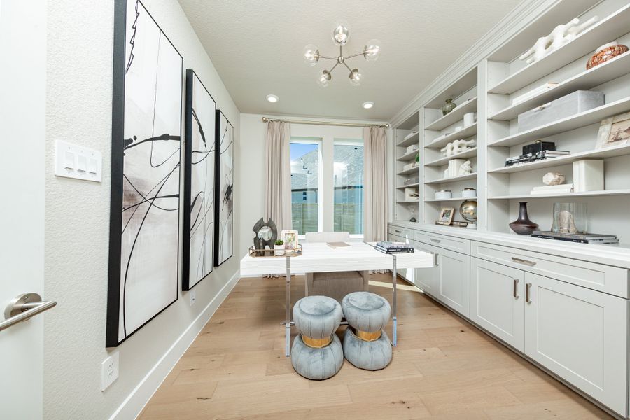 Furnished interior in a model home at ARTAVIA in Conroe (Image 14).
