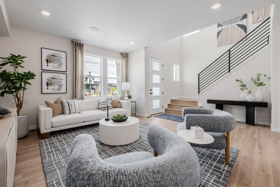 Furnished interior in a model home at Arras Park in Thornton (Image 35).