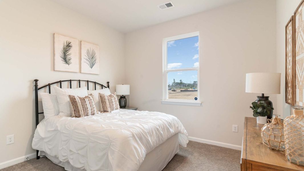 Furnished interior in a model home at Meadowview in Sumter (Image 13).