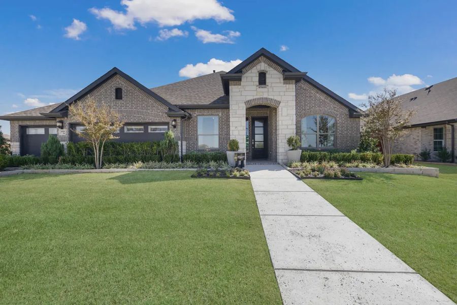 Front exterior of a home in the Heartland 50's & 60's community, located in Heartland, TX (Image 5).