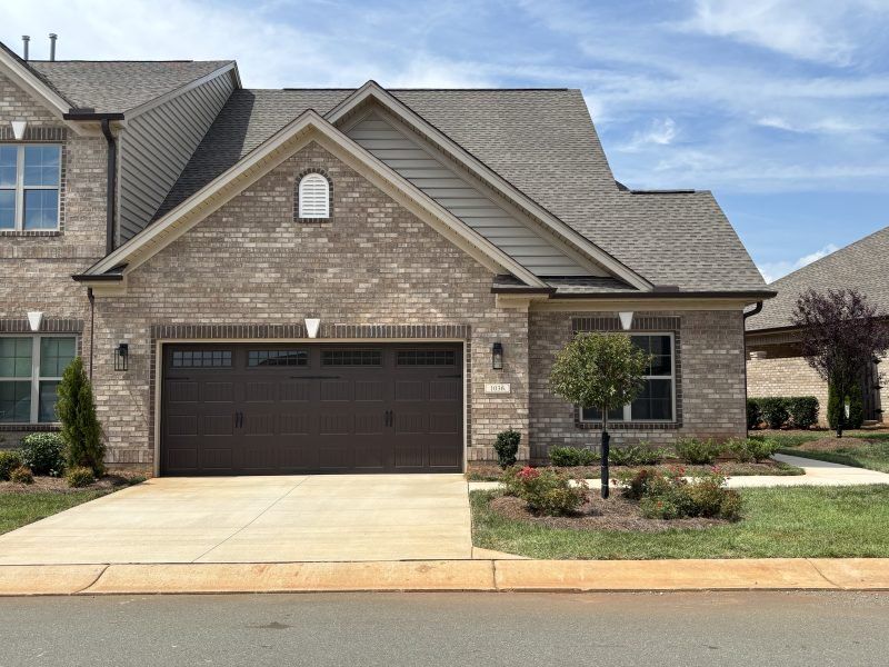 Front exterior of a home in the Mebane Towne Center community, located in Mebane, NC (Image 18). Front exterior of a home in the Mebane Towne Center community, located in Mebane, NC (Image 18).