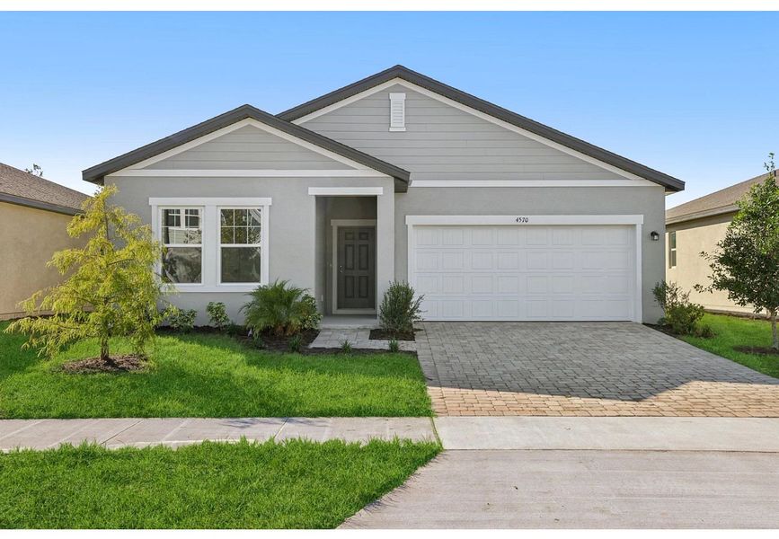 Front exterior of a home in the Hawks Run community, located in Kissimmee, FL (Image 10).