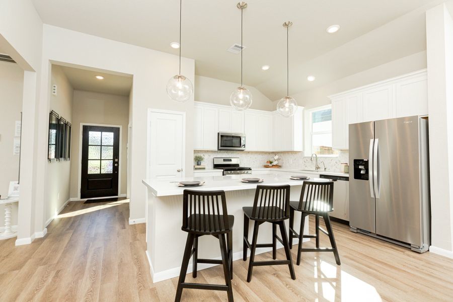 Furnished interior in a model home at Sunrise Cove in Texas City (Image 8).