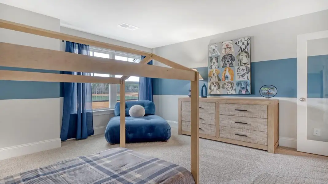 Furnished interior in a model home at Wappetaw Woods in Awendaw (Image 23).