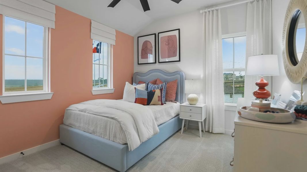 Elegant bedroom with chic coral accents and expansive windows, located in exclusive Mostyn Springs. Elegant bedroom with chic coral accents and expansive windows, located in exclusive Mostyn Springs.