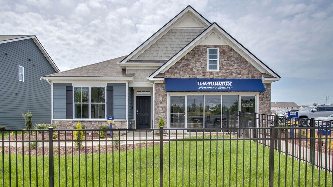 Front exterior of a home in the Villages of Hunters Point community, located in Lebanon, TN (Image 4). Front exterior of a home in the Villages of Hunters Point community, located in Lebanon, TN (Image 4).