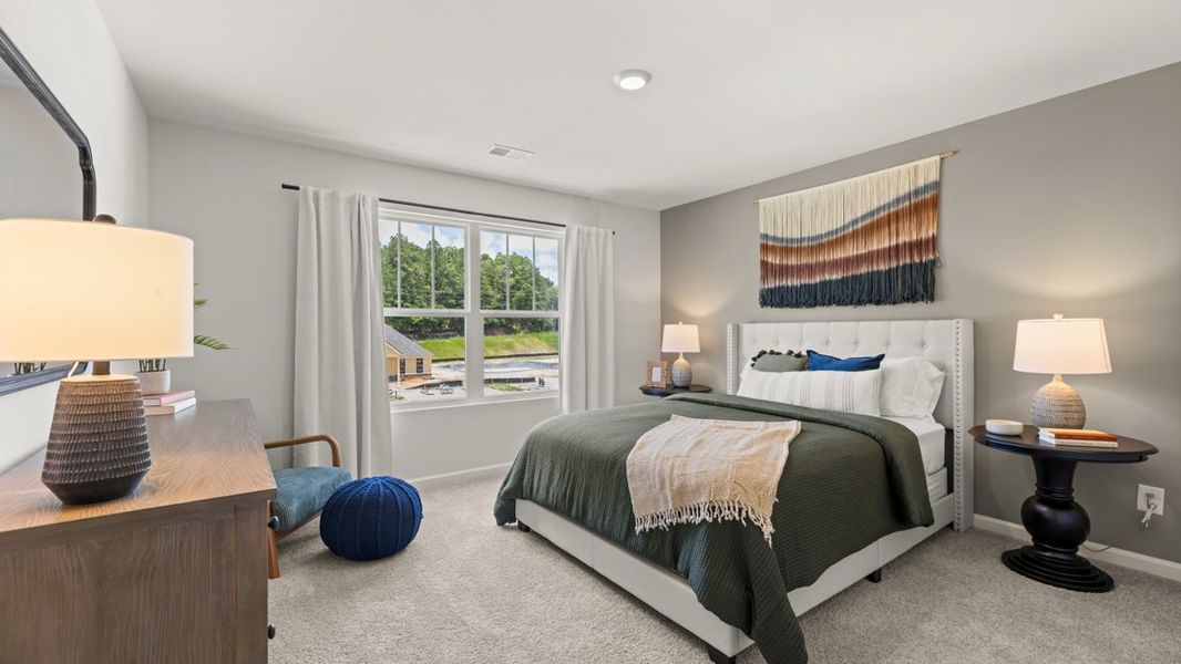 Furnished interior in a model home at Northwoods at Mirror Lake in Villa Rica (Image 28).