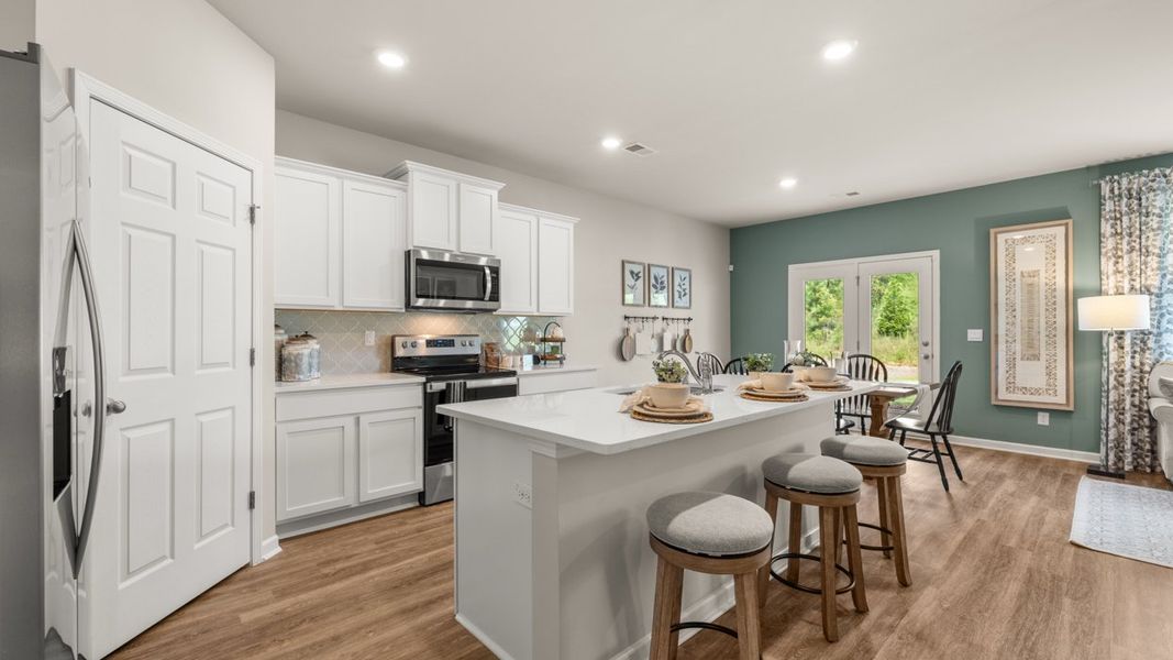 Furnished interior in a model home at Twin Lakes in Hoschton (Image 9).