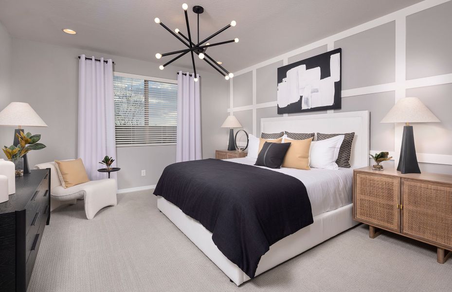 Owner's suite with modern accent wall new construction at El Rancho Santa Rosa in Maricopa, AZ