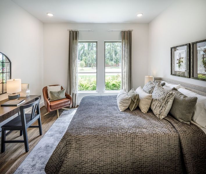 Furnished interior in a model home at The Highlands in Porter (Image 34).