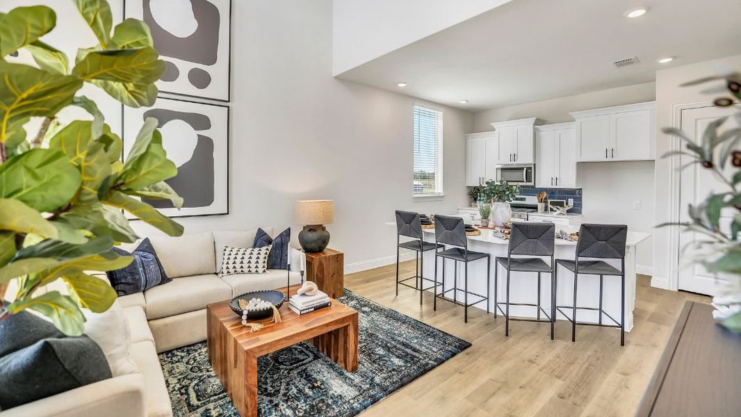 Furnished interior in a model home at The Avenue in Allen (Image 2).