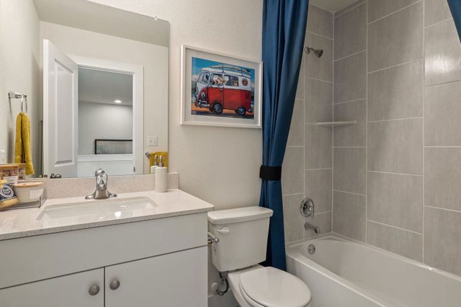 Furnished interior in a model home at Saddle Creek Twinhomes in Georgetown (Image 8).
