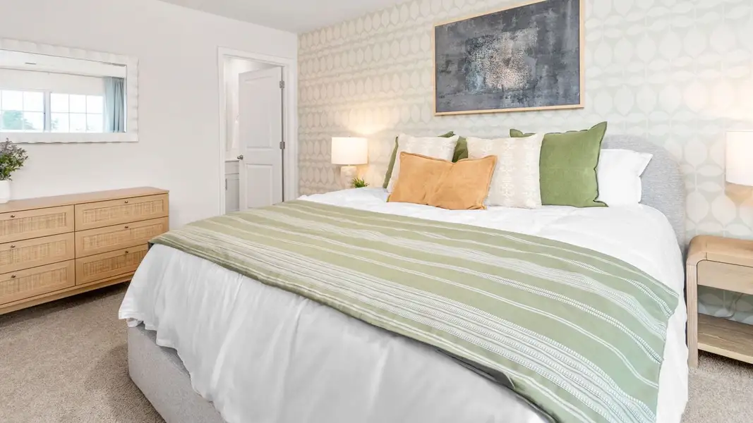 Furnished interior in a model home at North Village Townes in Greensboro (Image 25).