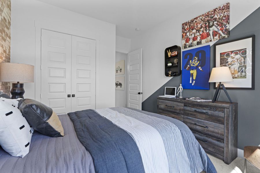 Furnished interior in a model home at Hunters Crossing in Sealy (Image 18).