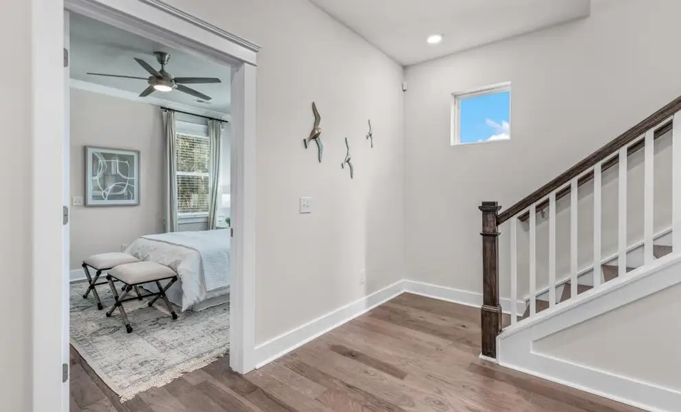 Furnished interior in a model home at The Bluffs at Pinefield Townhomes in Charleston (Image 2). Furnished interior in a model home at The Bluffs at Pinefield Townhomes in Charleston (Image 2).