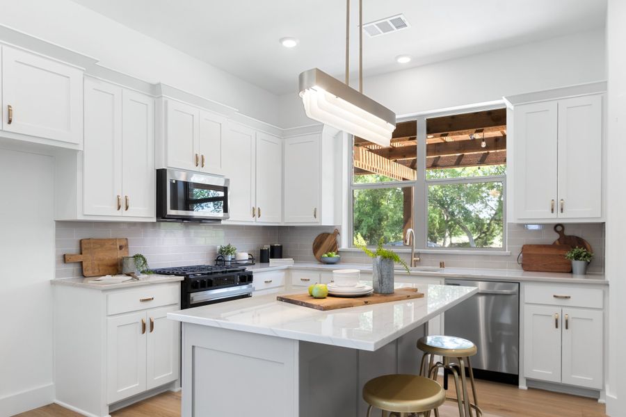 Furnished interior in a model home at Cottonwood Creek in Rowlett (Image 26).