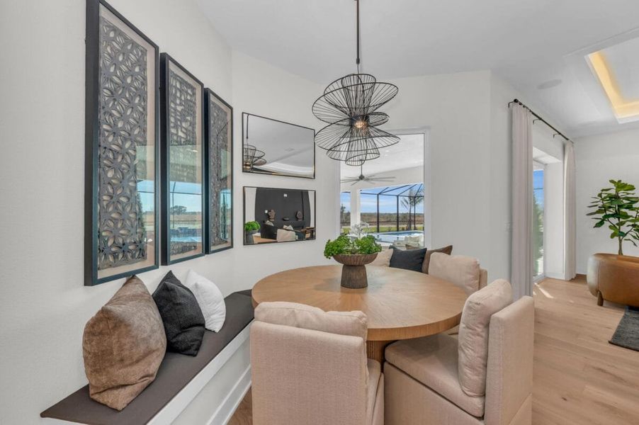 Furnished interior in a model home at Hampton Lakes in Sarasota (Image 144).
