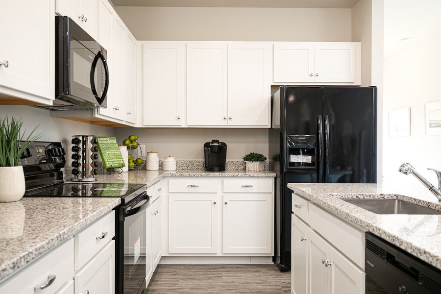 Furnished interior in a model home at The Cottages of Silvertown in Thomaston (Image 35).
