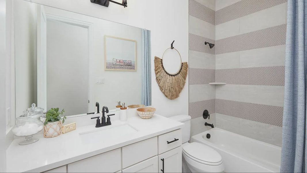 Furnished interior in a model home at Anthem in Kyle (Image 6).