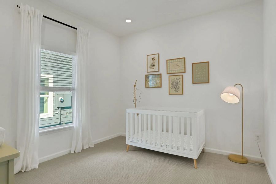 Furnished interior in a model home at Seminole Trace - Villas in Palm Coast (Image 19).