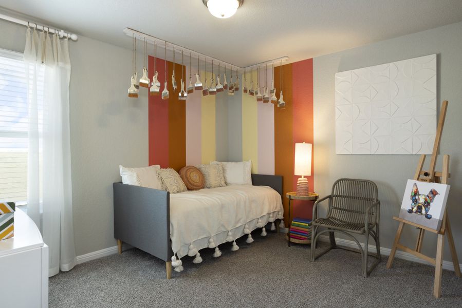 Furnished interior in a model home at Waterstone Crossing in Kyle (Image 33).
