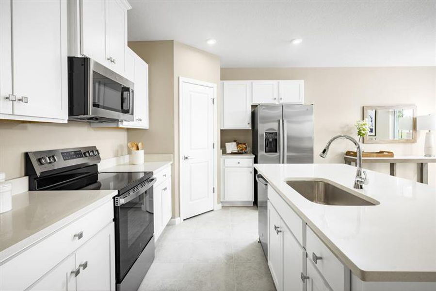 Furnished interior in a model home at Terra Lago in Indiantown (Image 5).