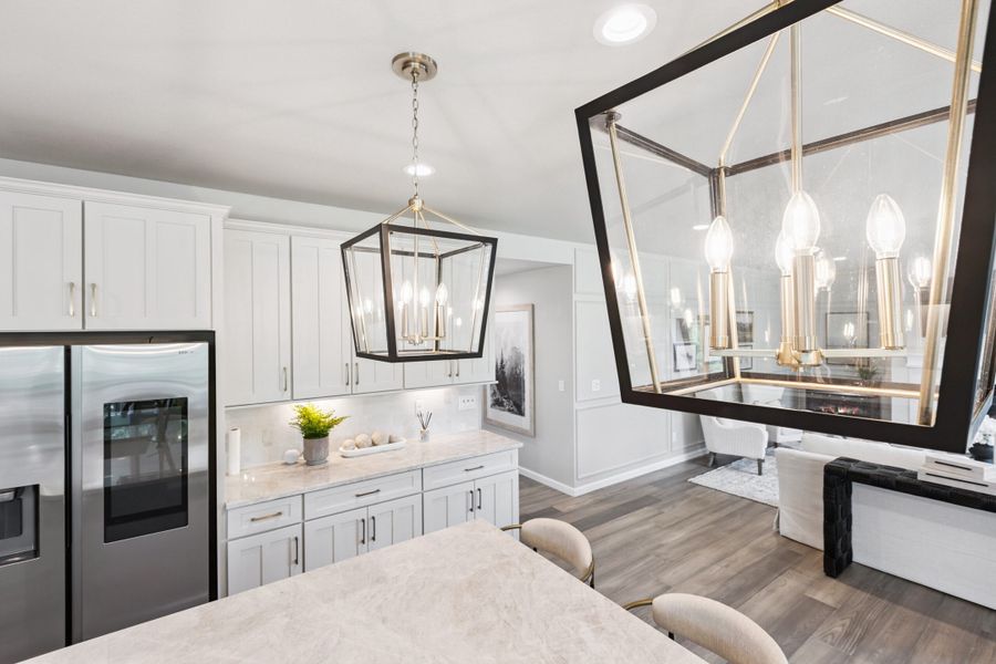 Furnished interior in a model home at Highlands Preserve in Mead (Image 17).